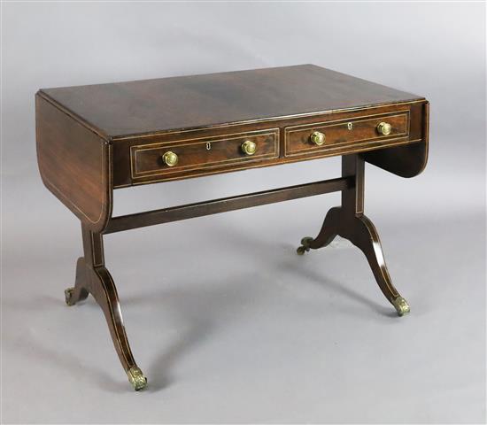A Regency boxwood strung rosewood sofa table, W.3ft 2in. D.2ft 1in. H.2ft 4in.